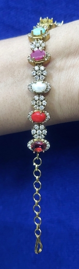 Picture of Gold toned bracelet with multiple stones