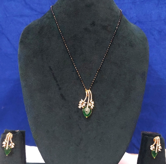 Picture of Black beads mangalsutra with floral design pendant